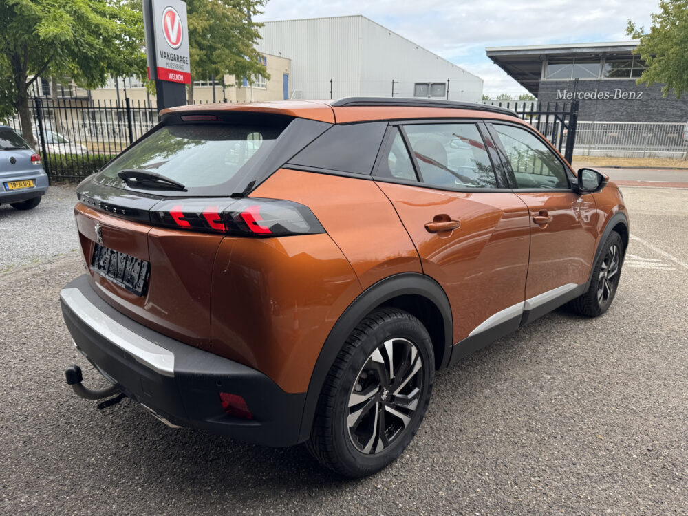Peugeot 2008 1.2 PureTech Allure // PANO/SCHUIFKANTELDAK // CLIMA // CAMERA // NAVI + CARPLAY // PDC V+A 4