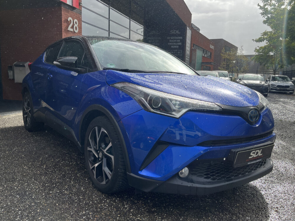 Toyota C-HR 1.8 Hybrid Bi-Tone // NAVI // CAMERA // DODENHOEK SENSOR // TREKHAAK // ADAPTIVE CRUISE // 2