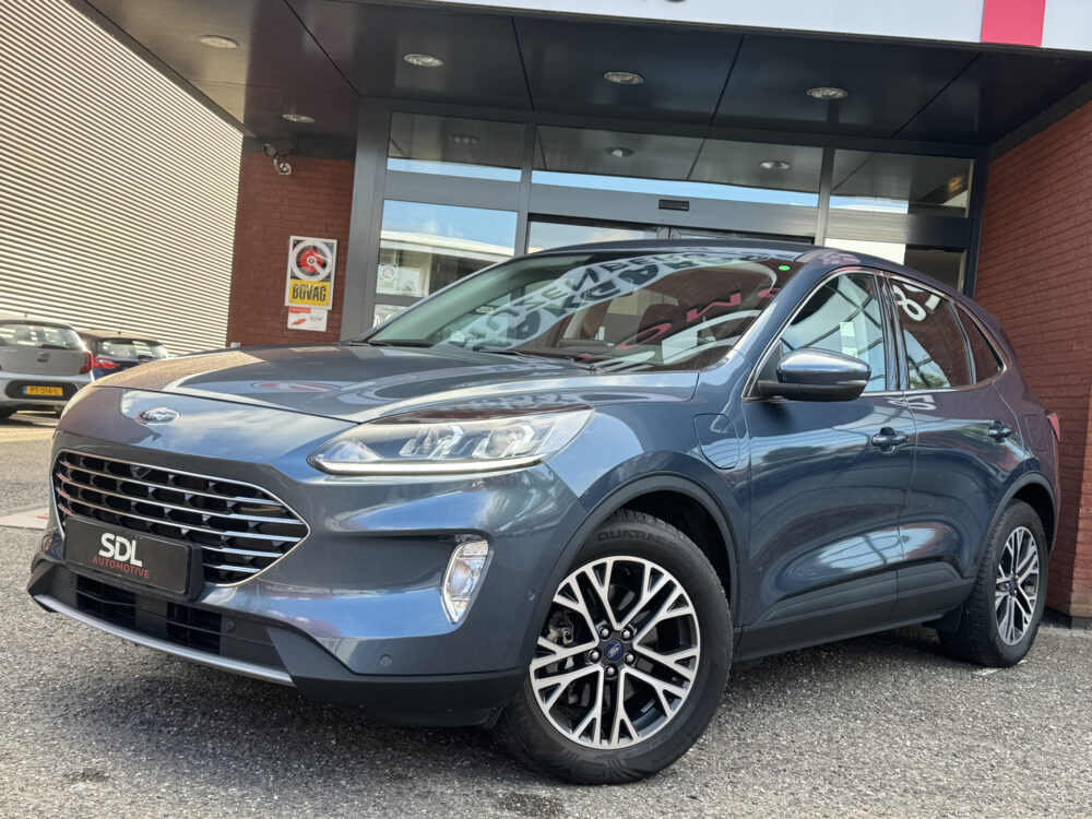 Ford Kuga 2.5 PHEV Titanium // CAMERA+SENSOREN // DODEHOEK // ADAPTIVE CRUISE // NAVI+CARPLAY // STOEL VERWARMING // 1