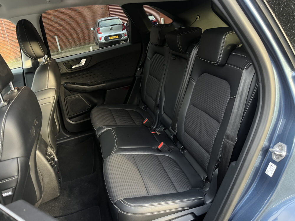 Ford Kuga 2.5 PHEV Titanium X // ADAPT. CRUISE // DODEHOEK // B&O SOUND // KEYLESS // NAVI+CARPLAY // WINTERPACK // FULL LED // 15