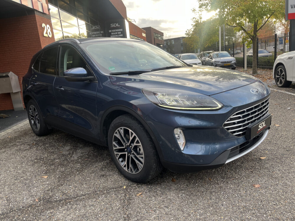 Ford Kuga 2.5 PHEV Titanium X // ADAPT. CRUISE // DODEHOEK // B&O SOUND // KEYLESS // NAVI+CARPLAY // WINTERPACK // FULL LED // 7