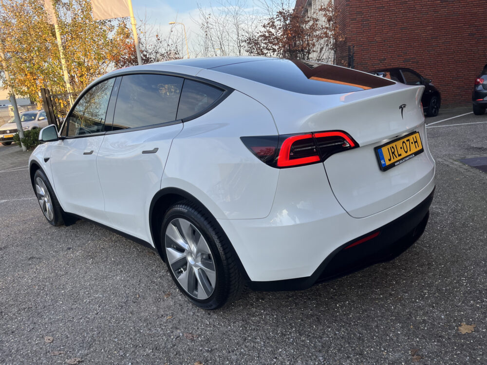 Tesla Model Y RWD 58 kWh 1STE EIGENAAR!! // PANODAK // NAVI // ADAPTIVE CRUISE // CLIMA // AUTOPILOT // 360 CAMERA // LEDEREN BEKLEDING // 3