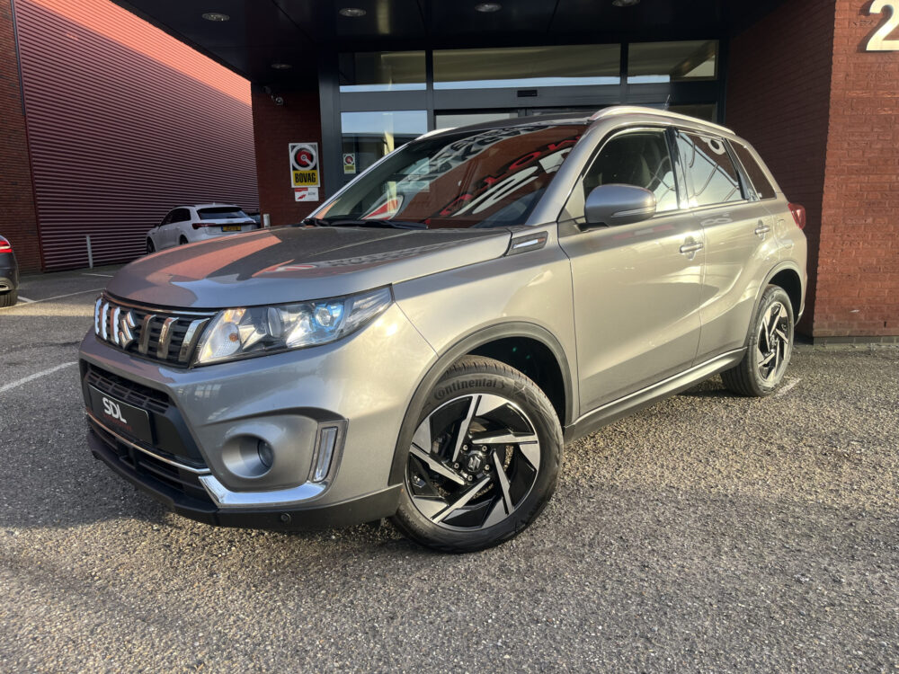 Suzuki Vitara 1.4 Boosterjet AllGrip Stijl // ADAPT. CRUISE // SCHUIF-KANTELDAK // CAMERA // STOELVERWARMING // KEYLESS // NAVI // 1