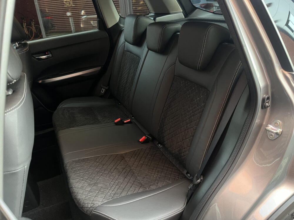 Suzuki Vitara 1.4 Boosterjet AllGrip Stijl // ADAPT. CRUISE // SCHUIF-KANTELDAK // CAMERA // STOELVERWARMING // KEYLESS // NAVI // 16