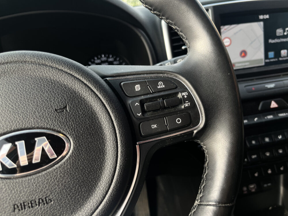 Kia Sportage 1.6 GDI Design Edition // LED // JBL AUDIO // KEYLESS // LEDER+ELEK. STOEL // NAVI+CARPLAY // CAMERA // STUUR+STOELVERWARMING // 24