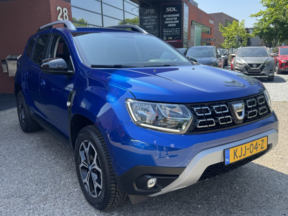 Dacia Duster 1.3 TCe Prestige // 360 CAMERA // DODEHOEK // CLIMA // CRUISE // NAVI+CARPLAY // 2