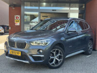 BMW X1 xDrive20i Executive // PANO / SCHUIF- KANTELDAK // NAVI // PDC V+A // CRUISE // TREKHAAK // ELEK. ACHTERKLEP // 34