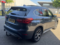 BMW X1 xDrive20i Executive // PANO / SCHUIF- KANTELDAK // NAVI // PDC V+A // CRUISE // TREKHAAK // ELEK. ACHTERKLEP // 37