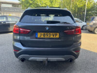 BMW X1 xDrive20i Executive // PANO / SCHUIF- KANTELDAK // NAVI // PDC V+A // CRUISE // TREKHAAK // ELEK. ACHTERKLEP // 38