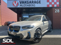 BMW iX3 High Executive 80 kWh M Sport Shadow Line 80 kWh // HUD-DISPLAY // SCHUIF-KANTELDAK // LEDER+ELEK. STOELEN // HARMAN&KARDON AUDI 40