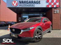 Mazda CX-30 2.0 e-SkyActiv-X M Hybrid Luxury 180 PK!! // NAVI // LEDER // SCHUIFKANTELDAK // TREKHAAK // CAMERA // MEMORY SEATS // BOSE AUDI 39