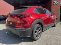 Mazda CX-30 2.0 e-SkyActiv-X M Hybrid Luxury 180 PK!! // NAVI // LEDER // SCHUIFKANTELDAK // TREKHAAK // CAMERA // MEMORY SEATS // BOSE AUDI 41
