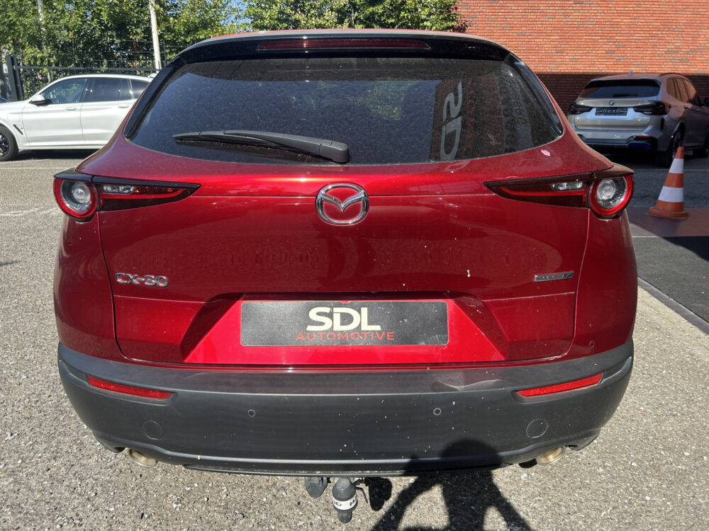 Mazda CX-30 2.0 e-SkyActiv-X M Hybrid Luxury 180 PK!! // NAVI // LEDER // SCHUIFKANTELDAK // TREKHAAK // CAMERA // MEMORY SEATS // BOSE AUDI 5