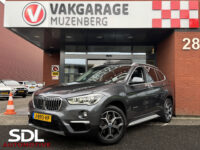 BMW X1 xDrive20i Executive // PANO / SCHUIF- KANTELDAK // NAVI // PDC V+A // CRUISE // TREKHAAK // ELEK. ACHTERKLEP // 34