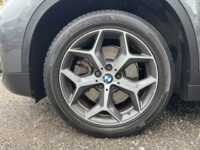 BMW X1 xDrive20i Executive // PANO / SCHUIF- KANTELDAK // NAVI // PDC V+A // CRUISE // TREKHAAK // ELEK. ACHTERKLEP // 43