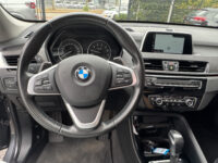 BMW X1 xDrive20i Executive // PANO / SCHUIF- KANTELDAK // NAVI // PDC V+A // CRUISE // TREKHAAK // ELEK. ACHTERKLEP // 48