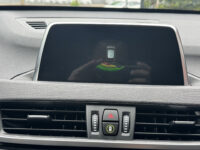 BMW X1 xDrive20i Executive // PANO / SCHUIF- KANTELDAK // NAVI // PDC V+A // CRUISE // TREKHAAK // ELEK. ACHTERKLEP // 51