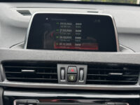 BMW X1 xDrive20i Executive // PANO / SCHUIF- KANTELDAK // NAVI // PDC V+A // CRUISE // TREKHAAK // ELEK. ACHTERKLEP // 54