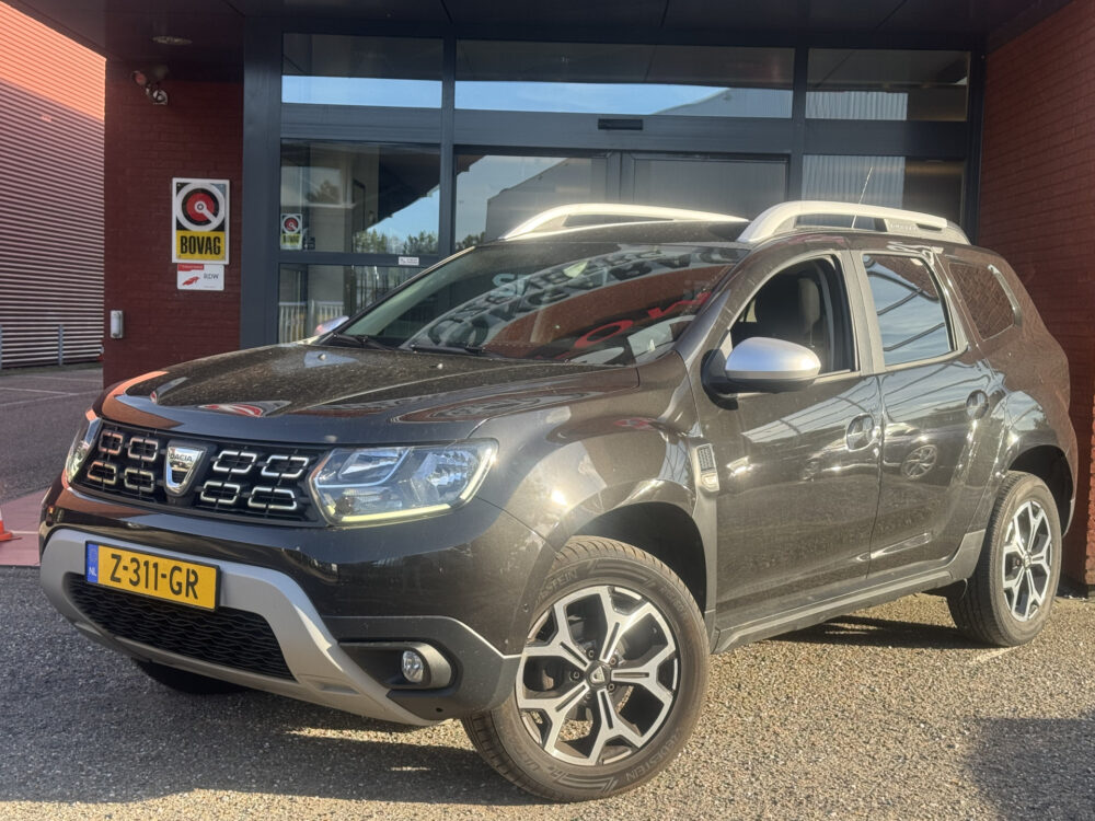 Dacia Duster 1.6 SCe Prestige // 360° CAMERA // NAVI // CLIMA // STOELVERWARMING // CRUISE // BLIND SPOT MONITOR // 1