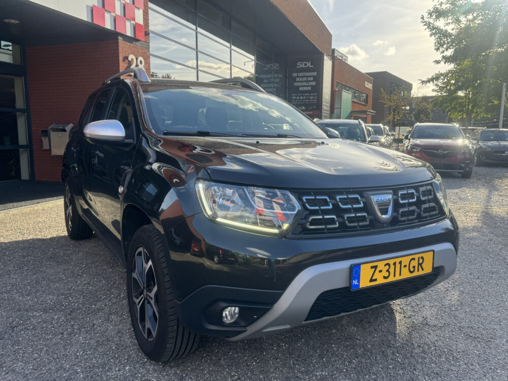Dacia Duster 1.6 SCe Prestige // 360° CAMERA // NAVI // CLIMA // STOELVERWARMING // CRUISE // BLIND SPOT MONITOR // 2