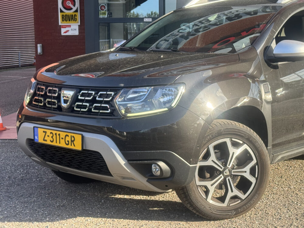 Dacia Duster 1.6 SCe Prestige // 360° CAMERA // NAVI // CLIMA // STOELVERWARMING // CRUISE // BLIND SPOT MONITOR // 7