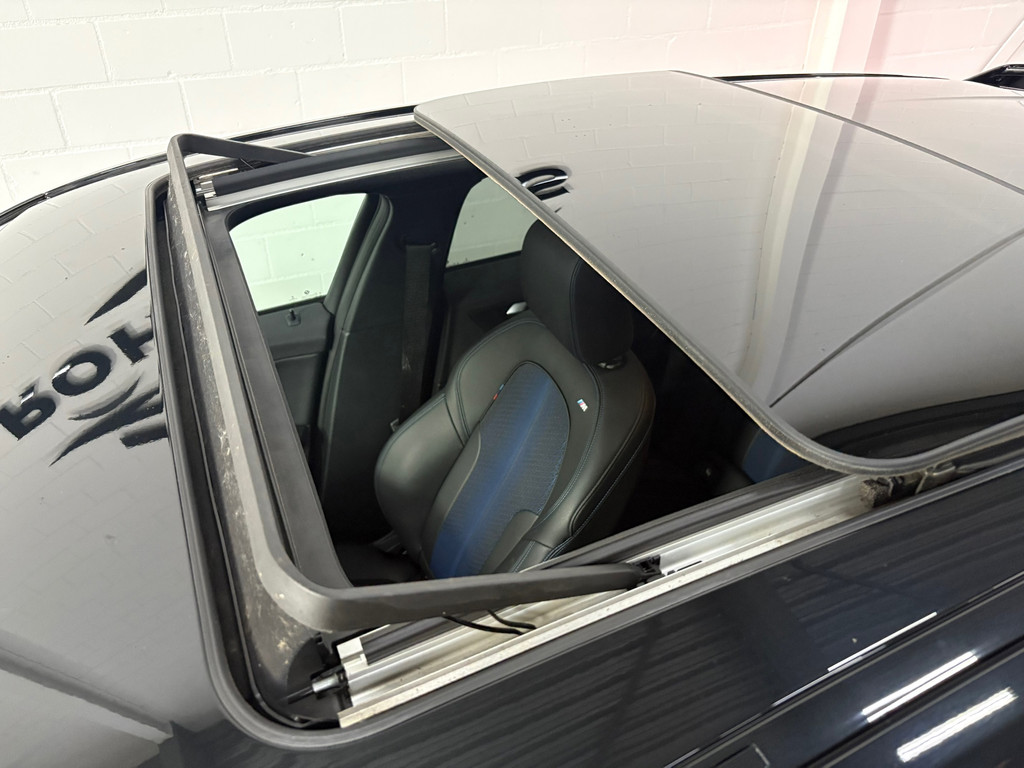 BMW 1-serie 118i High Executive, Pano, Sfeerverlichting, Applecarplay 1